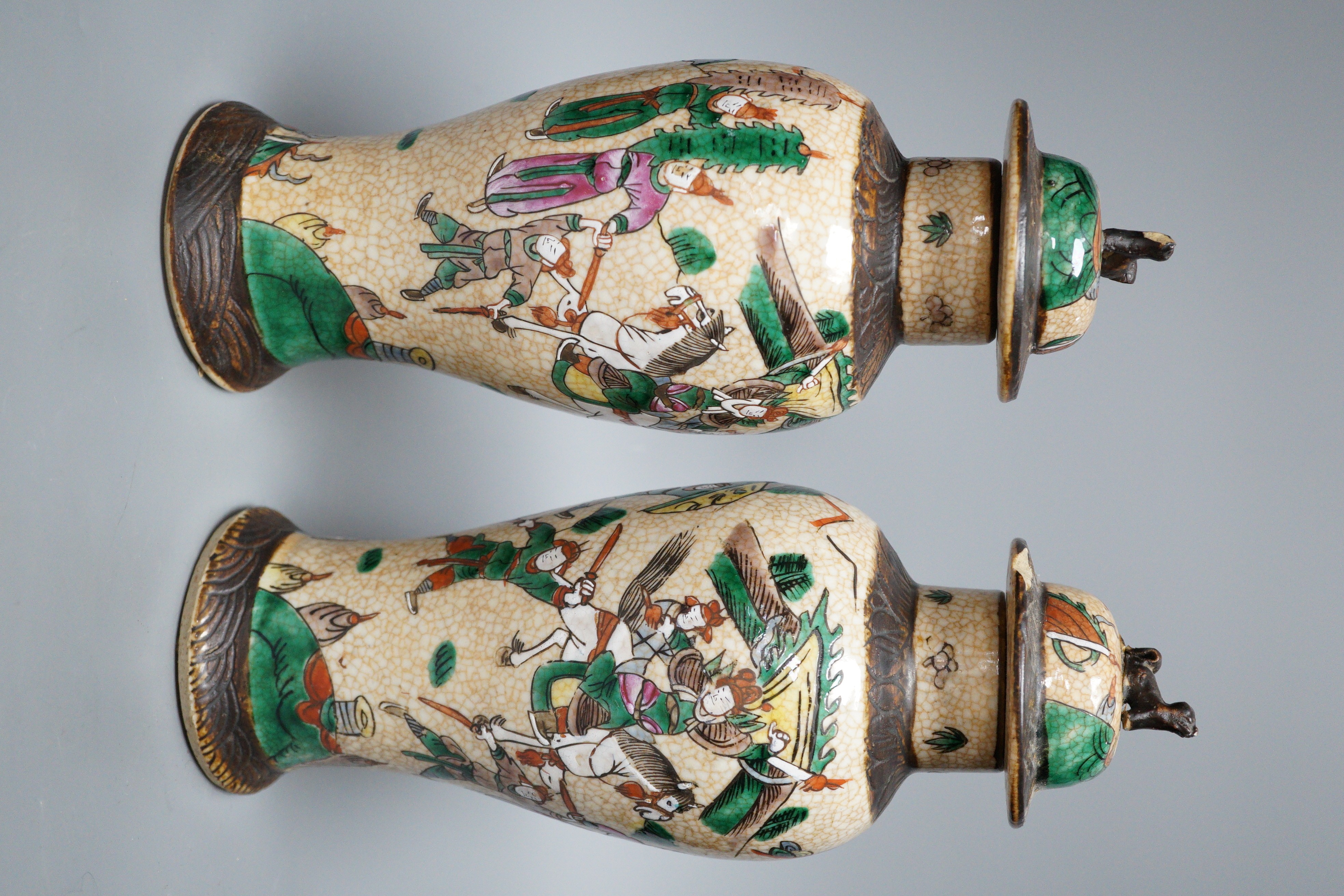 A pair of Chinese crackleware lidded vases, 30cm